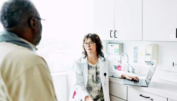 Man talking to healthcare provider